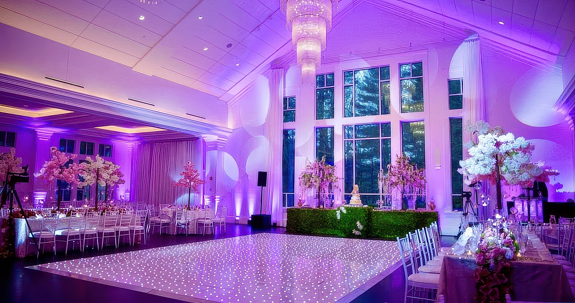 White starlit LED dancefloor sparkling in a grand purple-lit ballroom